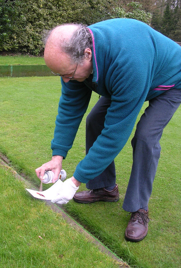 Keith Reynard painting rink markers