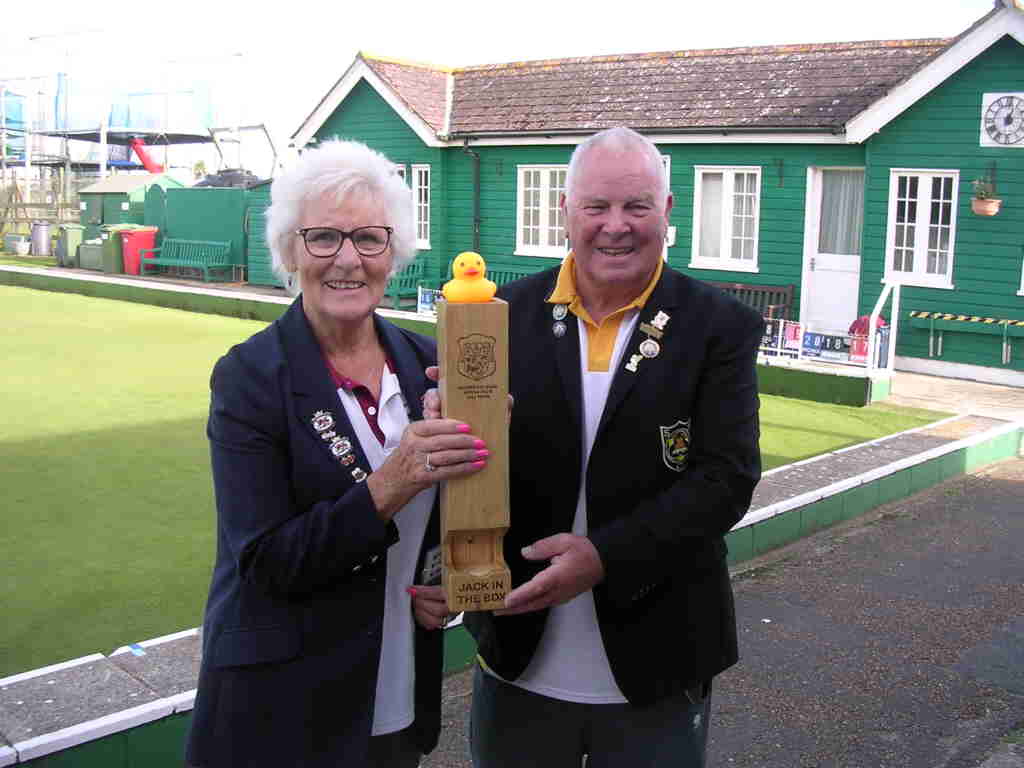 Captain Sheila presenting the host club captain with one of our 'jack in the box' jack holders