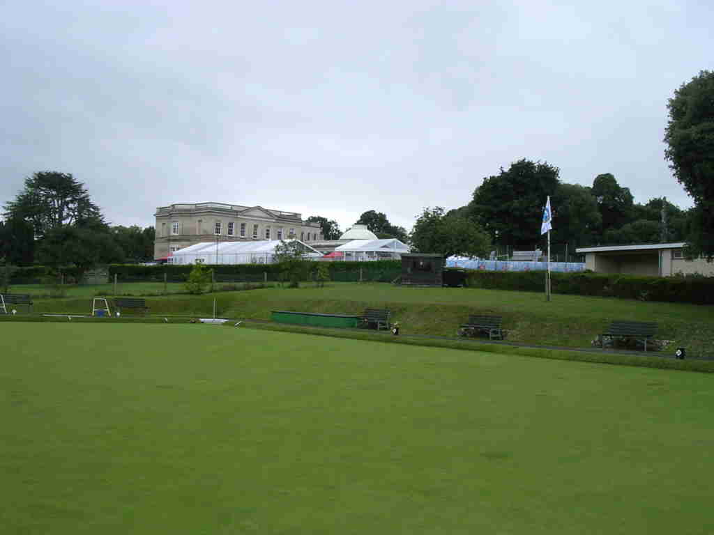 part of bowls green with impressive building behind