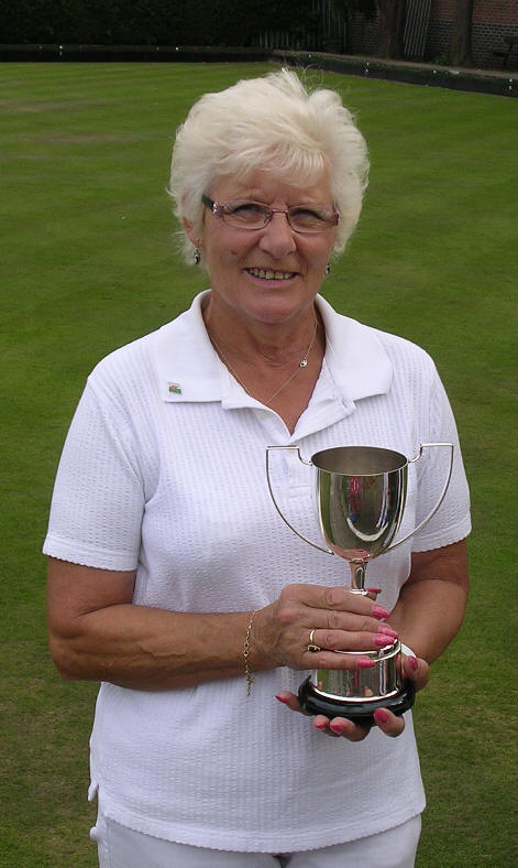 bowler with trophy