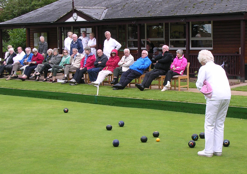 bowlers and watching crowd